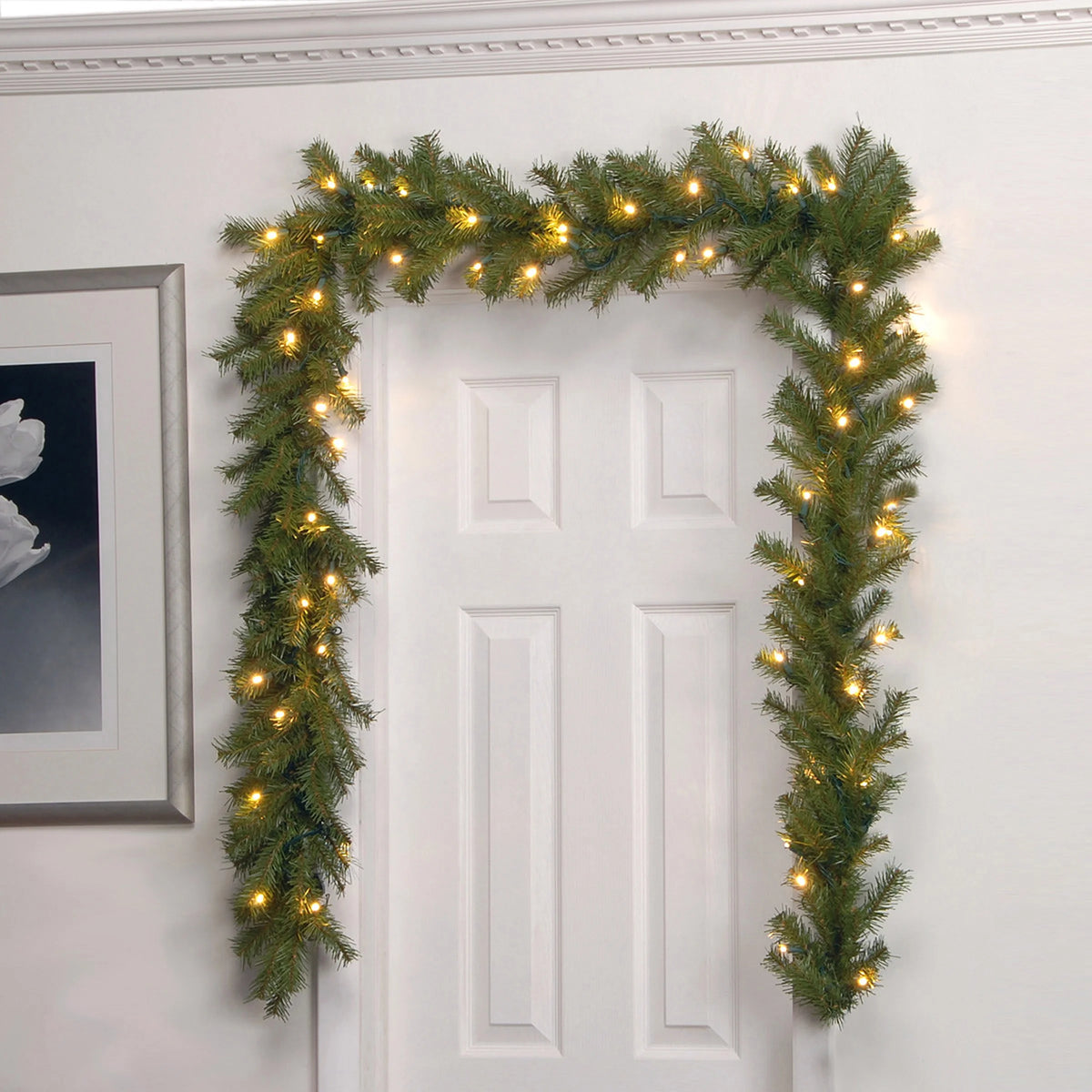 Pre-Lit Artificial Christmas Garland, Green, Norwood Fir, White Lights, 9 Feet H5951